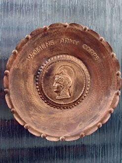 Images Dated 23rd January 2007: A handmade metal plate, stamped Womens Army Corps