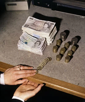 Piles Gallery: Hands counting money, notes and coins