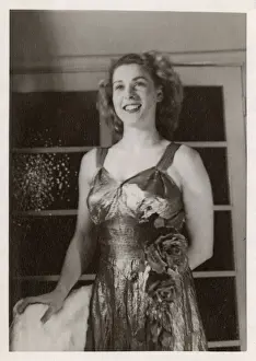 Straps Prints: Happy young woman in a silk (or tafeta) ball gown
