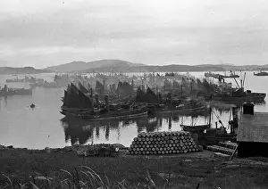 Stacked Prints: Harbour scene with boats and barrels, Scotland