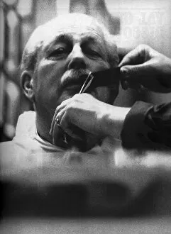 Harold Macmillan at the barbers