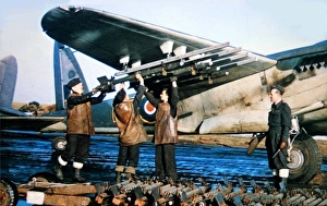 Projectiles Gallery: De Havilland DH98 Mosquito FBIV being armed with 3-inch