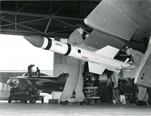 Pylon Gallery: A de Havilland Firestreak air-to-air missile being loade?