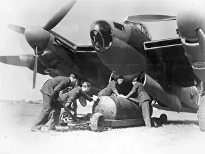 Loaded Prints: de Havilland Mosquito BXVI being loaded with a 4000lb bomb