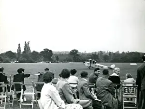 Hawker Cygnet, G-EBMB, is taxied past the crowd by Frank?