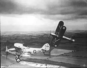 Audax Prints: Hawker Fury K5676 makes a mock attack on Hawker Audax