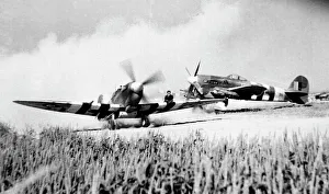 Passing Collection: Hawker Typhoon Ib with Spitfire IXb passing in Normandy