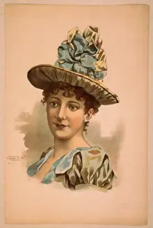 Head-and-shoulders image of brunette woman, facing right, we