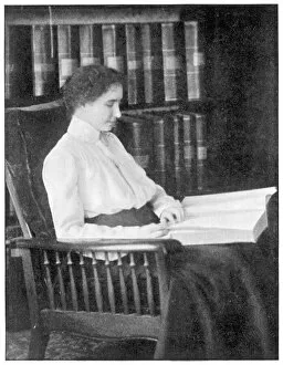Helen Keller reading Braille