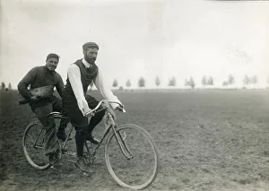 Henry Farman, 1874-1958, on the front of a tandem bicycle
