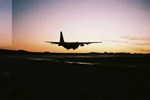 Sunset Collection: Hercules at Sunset ? RAF Stanley