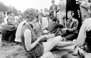 Hippies relaxing in a field at Woburn Park
