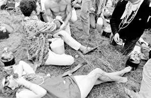 Hippies relaxing in a field at Woburn Park