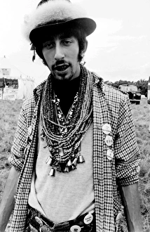 Grassy Collection: Hippy man in a field at Woburn Park