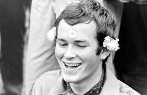 Hippy man with flowers at Woburn Park
