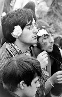 Smelling Prints: Hippy man with flowers at Woburn Park