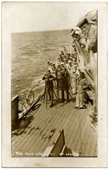 Cardiff Gallery: HMS Cardiff, British cruiser, with film crew at work on deck