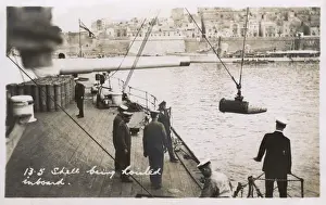 Duke Class Prints: HMS Marlborough - 13. 5 inch shell being hoisted aboard