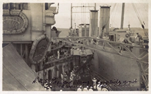 HMS Pegasus alongside HMS Marlborough recovering seaplane HMS Pegasus alongside HMS Marlborough recovering seaplane