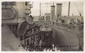 Aboard Prints: HMS Pegasus alongside HMS Marlborough recovering seaplane