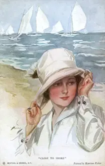 Shoreline Prints: Holding on to hat in a strong breeze