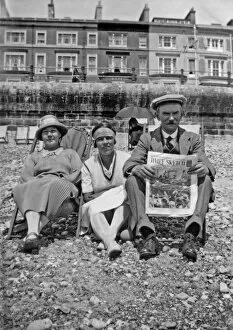 Holidaymakers on the beach at Hastings, Sussex