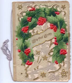 Images Dated 21st September 2018: Holly and gold stars on an ornate Christmas card