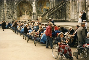 Await Gallery: Hopeful Sick Await Mass