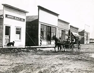Horese and buggy, street in Dawson City, Canada, c. 1920
