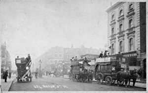 Baker Collection: Horse buses in Baker Street, Marylebone, London