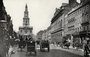 Horse drawn traffic & pedestrians along The Strand, London