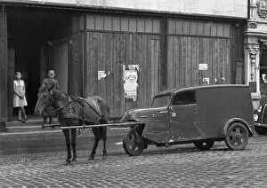 Cobblestones Collection: Horse pulling a vehicle