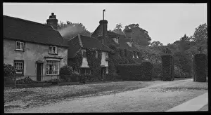 Roadway Prints: Houses approaching a grand gateway