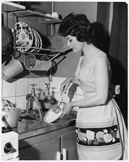 Housewife Washing Up