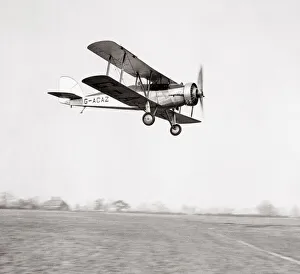 Houston-Weston two seater biplane, in flight, 1933