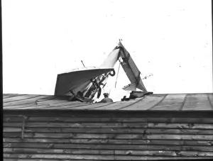 Hubert Lathams Antoinette monoplane crashed on a roof