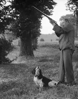 Hunter with Gun & Dog