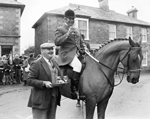 Huntsman enjoys a stirrup cup