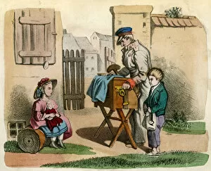 Images Dated 28th July 2016: Hurdy Gurdy man and boy with rich girl and doll