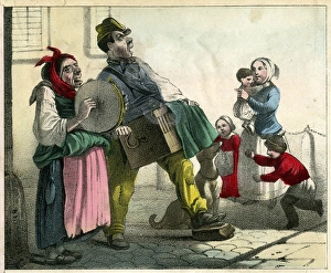 Images Dated 28th July 2016: Hurdy Gurdy man and woman performing in street
