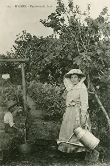 Countrywoman Prints: Hyeres, France - Countrywoman with watering can