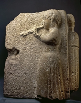 Iberian frieze relief depicting a woman or auletris Iberian frieze relief depicting a woman or auletris
