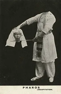 Magician Prints: Illusionist magic show by Pharos, with fake decapitation