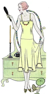 Bedroom Prints: Illustration of a lady in her bedroom admiring her embroidered petticoat in crepe-de-chine Date: 1931