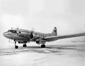 Ilyushin Prints: Ilyushin Il-12 (forward view) taxying in snow-Aeroflot