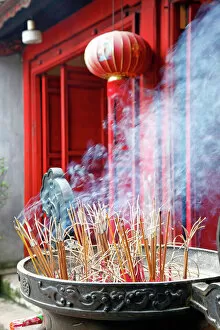 Prayer Collection: Incense sticks burning in Den Ngoc Son, Temple Hanoi