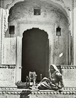 Slides Collection: India - An Indian Woman Spinning in an ornate entrance