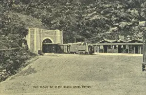 India - Train coming out of the tunnel at Barog