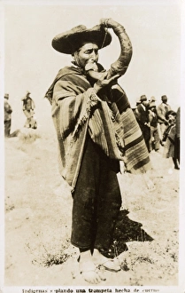 Amerindian Collection: Indian blowing a trumpet made ​​of horn