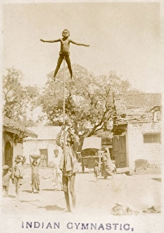 Gymnast Gallery: Indian child gymnast atop a long pole
